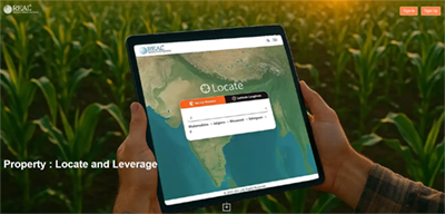Tablet showing a map with a login popup in a cornfield background, video player controls visible